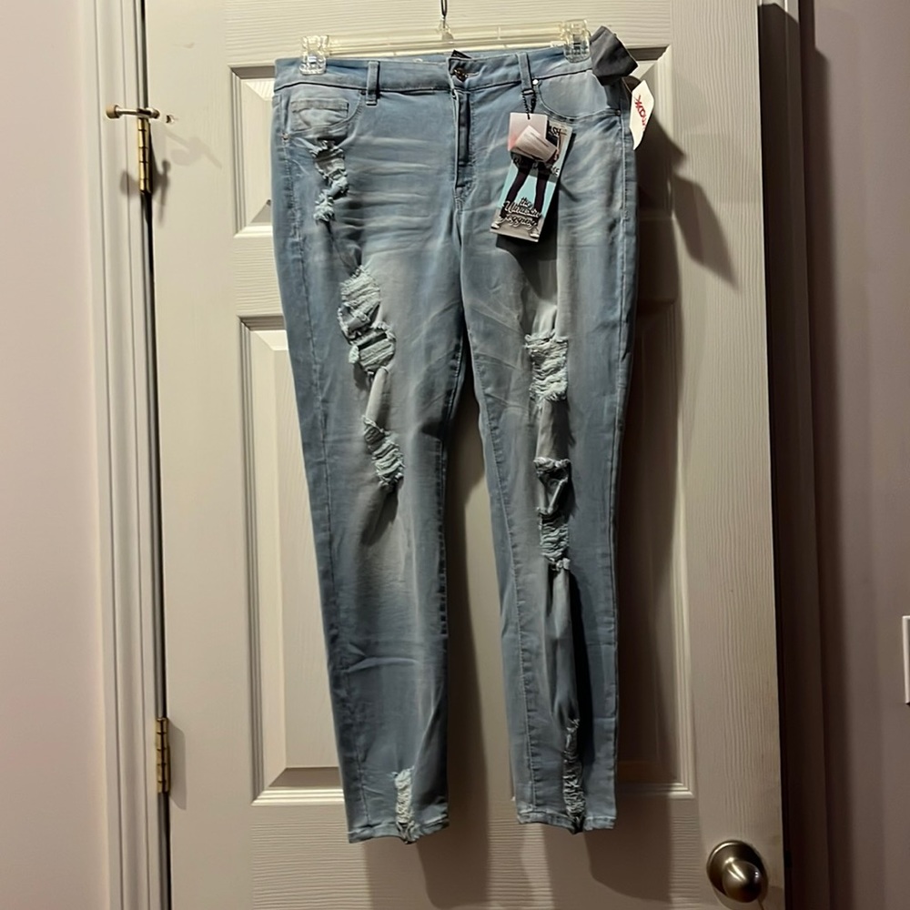 Light wash distressed skinny jeans